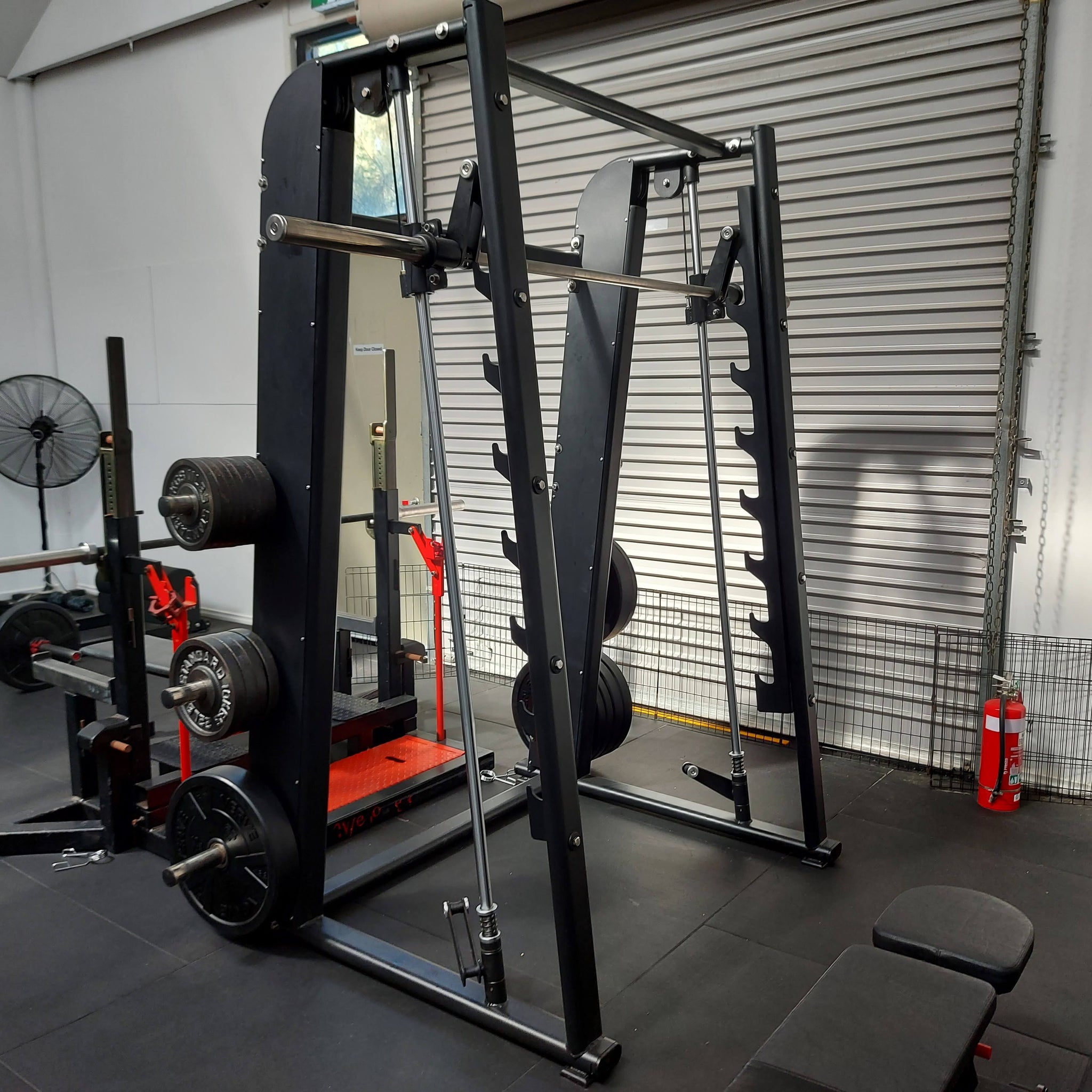 UNLEASH YOUR STRENGTH WITH THE VERSATILITY OF A SMITH MACHINE